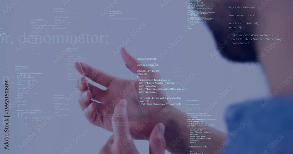 Fototapeta premium Interacting developer hands manipulating code overlay in studio workspace, wearing light blue shirt