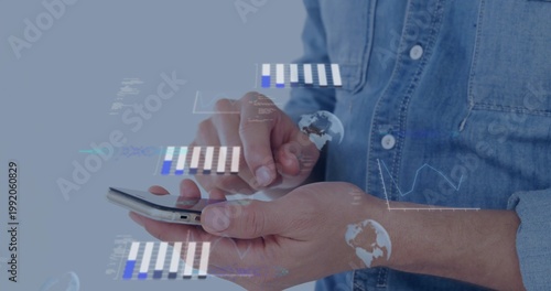 Tapping male hands navigating phone touchscreen in studio, with denim shirt and data overlays