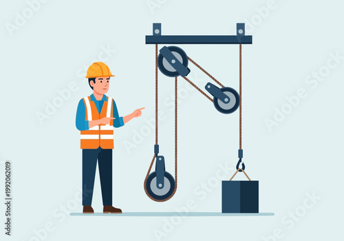作業員が工場の設備を点検している様子で、吊り上げ装置を操作している場面です。
