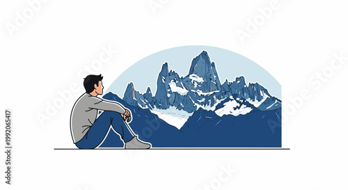 A person sits peacefully observing majestic snow-capped mountains under a clear sky