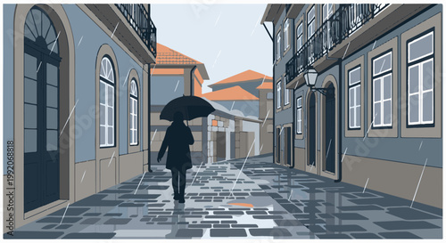A person walks with an umbrella down a cobblestone street on a rainy day