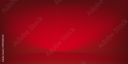 Dark red background with subtle highlight effect. The spotlight creates a gradation from bright red in the center to dark red at the edges.