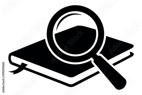 A magnifying glass lies on top of a closed book for research purposes