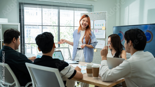 Canvas-taulu young Asian Gen Z business team meeting and collaborate in modern office