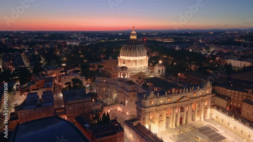 Aerial city view St. Peter's basilica in Rome, aerial shot at sunset with drone. San Pietro, Roma. 