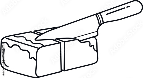 Knife cutting block of butter.