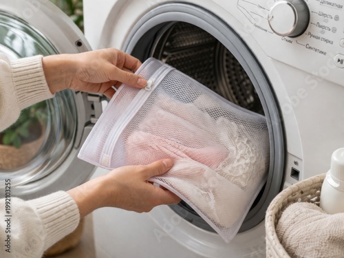 Loading Delicates into Mesh Laundry Wash Bag