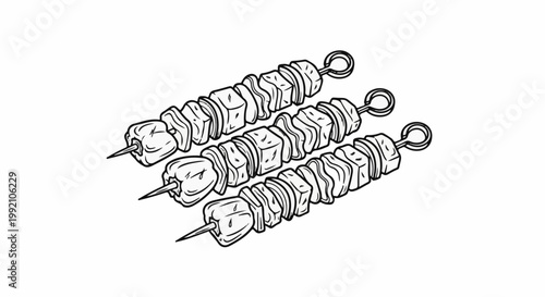 Three uncooked meat and pepper skewers on white