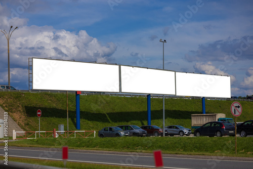 Background for design, billboards on city streets and along roads in the summer day