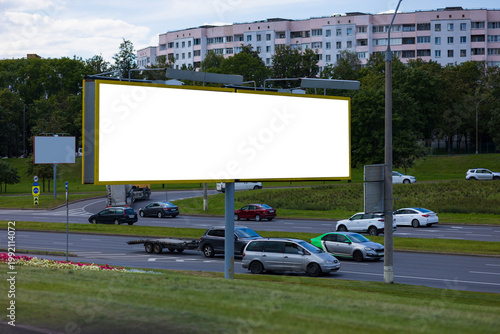 Background for design, billboards on city streets and along roads in the summer day