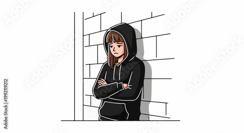 A sad person in a black hoodie leans against a brick wall