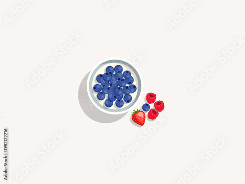 Top view of greek yogurt bowl loaded with fresh blueberries and berries on the side