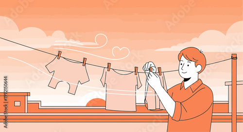 Man hanging laundry on clothesline on rooftop at sunset, wind blowing clothes