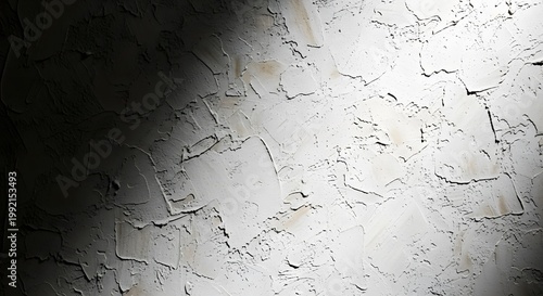 textured concrete wall with dramatic light and shadow