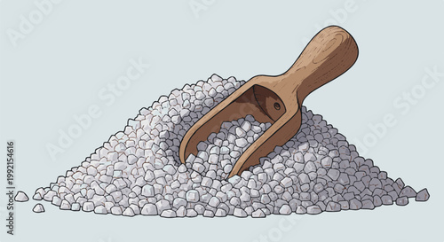 A wooden scoop rests in a pile of granular white material on a light gray background