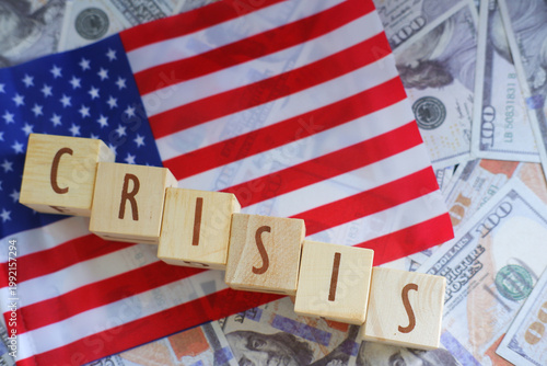 The US financial crisis is depicted using text on the United States flag. The concepts of crisis, recession, and the country's economy are also an abstract symbol of the pandemic problem.