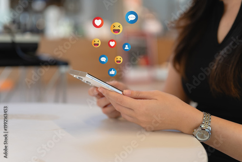 The concept of living on vacation and playing social media. Social media and digital online concept, man using smart phone with Social media. Social Distancing ,Working From Home concept.