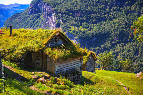 Historic Skagefla farm on a steep mountainside above Geirangerfjord in Norway.