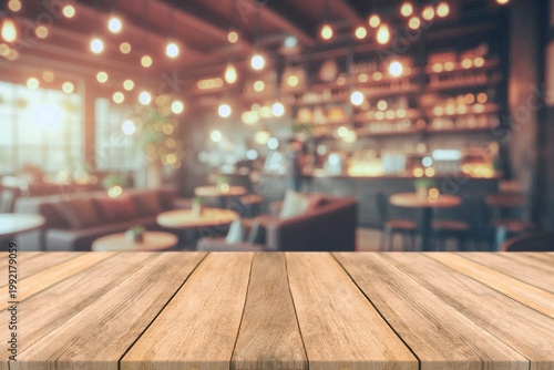 Empty wooden table top with blurred coffee shop and bokeh background for product display.