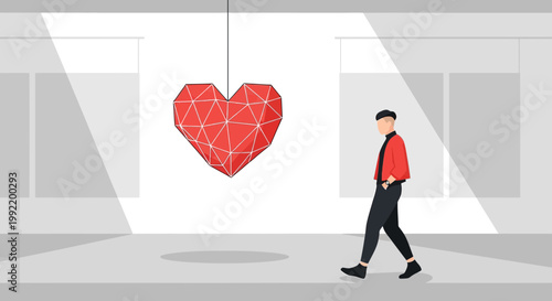 Man admires large geometric red heart sculpture in modern art gallery