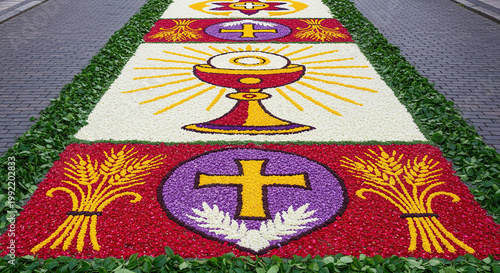 Vibrant floral carpet with cross and wheat on street