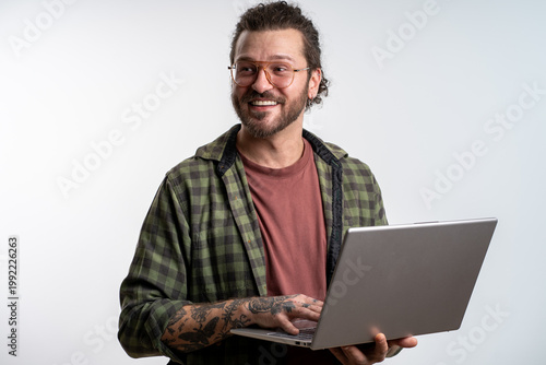 Freelancer coder using laptop on isolated white background portrait