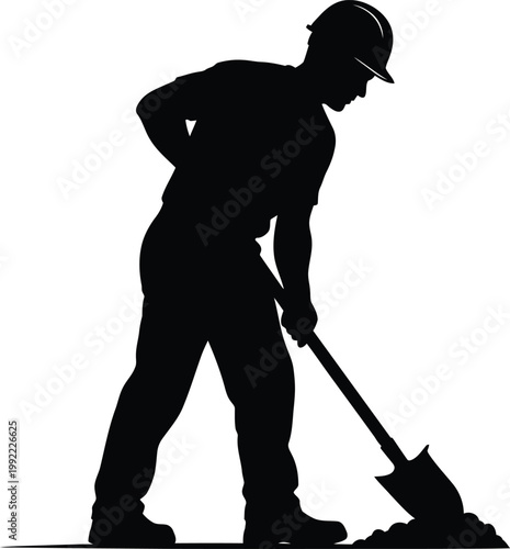 Construction worker silhouette digging with shovel wearing safety helmet