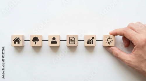 Step by step business process sequence and development planning with wooden cubes