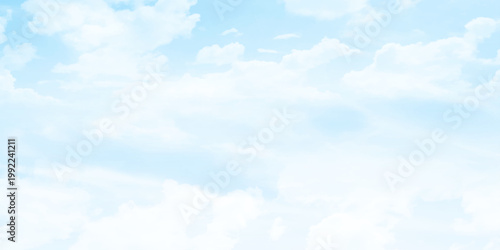sky is blue with many clouds. The clouds are scattered throughout the sky. Minimalist sky background with subtle white cloud texture