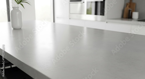 Empty white kitchen island countertop in modern minimalist home interior