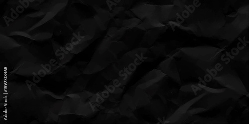 Old paper background black crumpled paper. Old crumpled texture black cardboard sheet of empty paper black background.