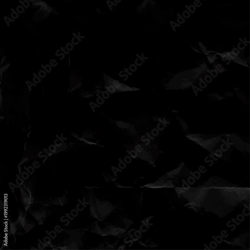 Old paper background black crumpled paper. Old crumpled texture black cardboard sheet of empty paper black background.