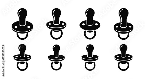 Collection of black pacifiers presented in a minimalist silhouette