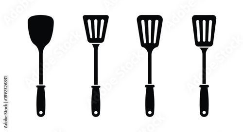 Four black kitchen spatulas displayed in a minimalist silhouette