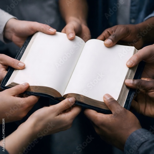 Diverse group of people sharing an open book together