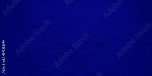 Navy blue stone texture background with subtle marble veins and dark slate rock surface for elegant moody design