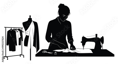 A fashion designer works at her sewing machine with garments on display a striking black silhouette high quality professional detailed modern