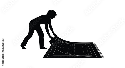 A woman is depicted rolling up a patterned rug on a white background shown as a striking silhouette high quality professional