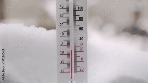 Hot whether concept, thermometer showing high temperatures under a bright and intense sun, summer tropical weather, drought in dessert.