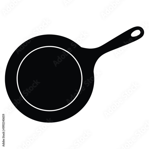 A simple black graphic depicts a cast iron skillet a common cooking utensil silhouette