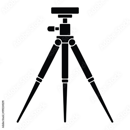 A stark black silhouette of a professional tripod commonly used in photography and filmmaking silhouette
