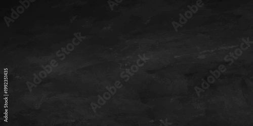 A dark and vintage black and white grunge background features a textured old stone wall pattern with a rough gray concrete surface and smoky paper backdrop design