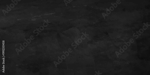 A dark vintage textured backdrop featuring an old rough stone wall with a black and white grunge pattern and aged dirty grey concrete surface design