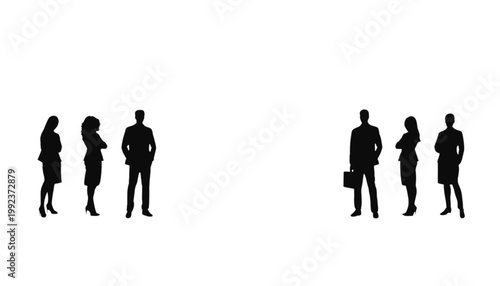 Businesspeople stand in two separate groups to represent a professional divide in the corporate office.
