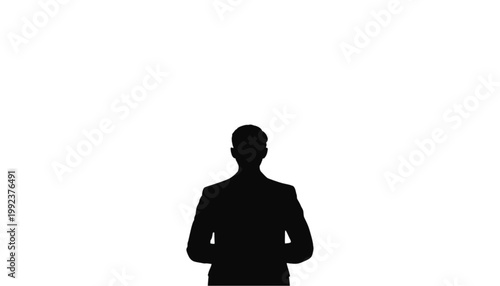 Businessman stands with his arms folded to show a confident and professional posture for the brand.