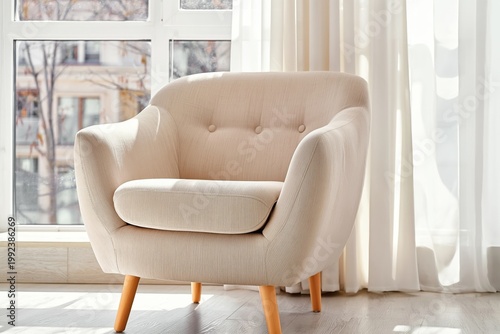 Comfortable Chair by the Window With Natural Light in a Living Room on a Sunny Day
