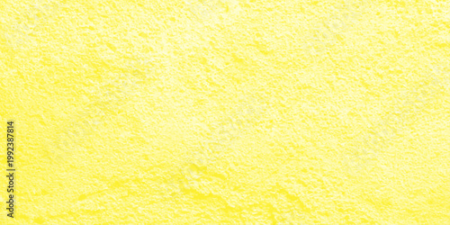 Abstract yellow paper texture and sponge pattern design with a rough grunge surface closeup creates a natural fiber backdrop wallpaper