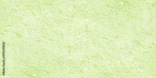 Green grunge paper texture with an abstract vintage pattern on an aged rough surface for a blank antique cardboard backdrop design