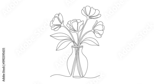 A bouquet of pink roses in a glass vase with green leaves.