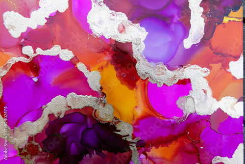 A purple background with gold accents. The gold accents are scattered throughout the background, creating a sense of luxury and opulence. 